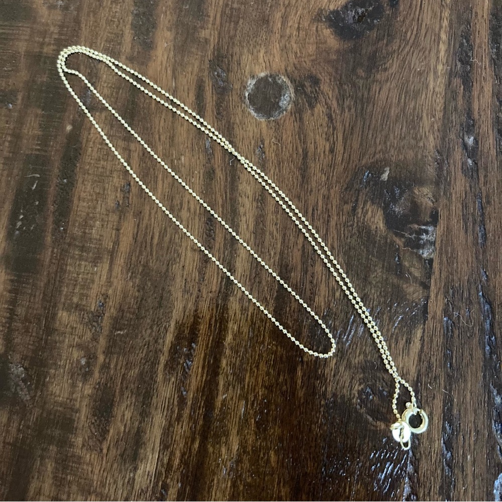CHANEL Charm and 18k Gold Necklace CC Gold Holiday 2023 - Picture 5 of 9